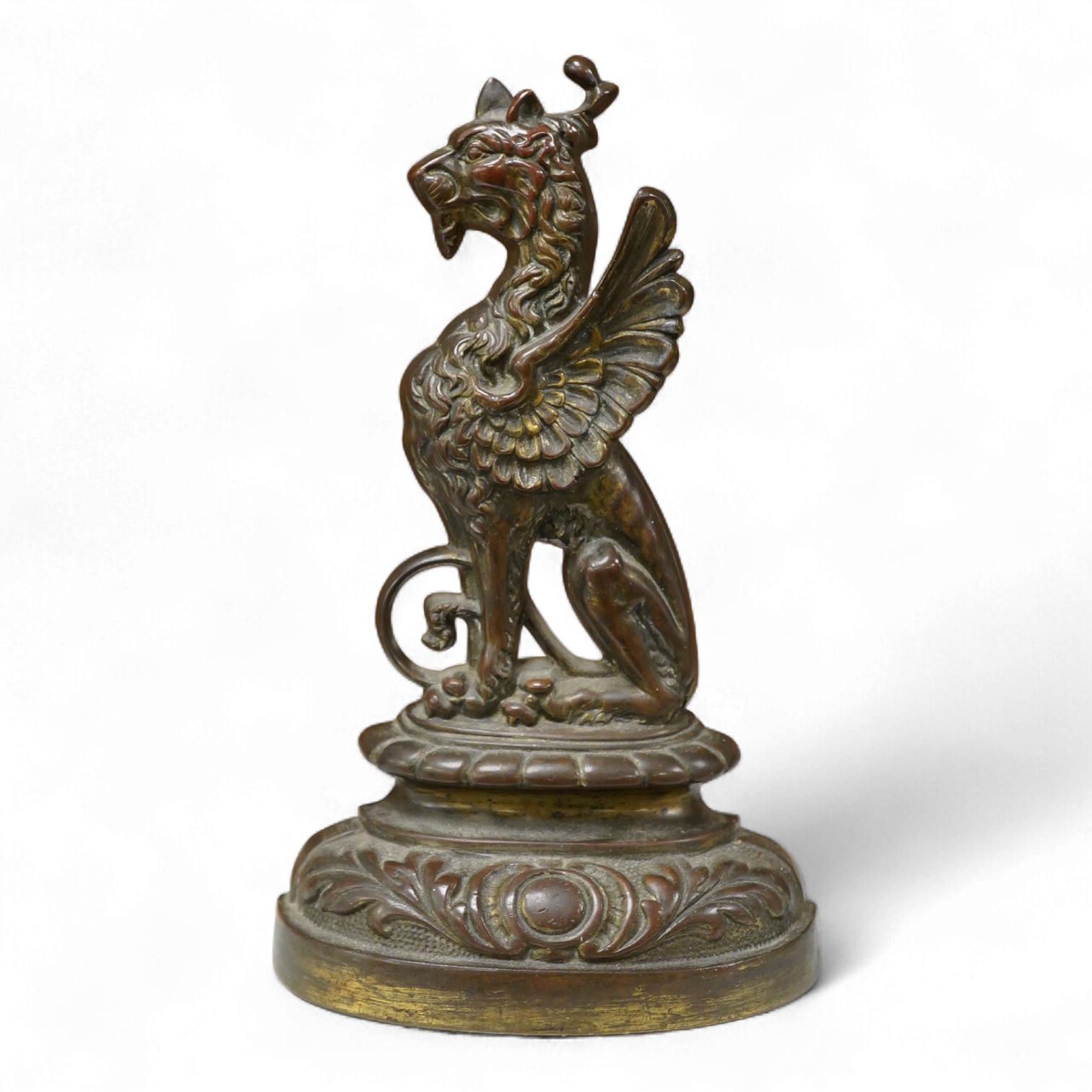 A Victorian gilt bronze doorstop in the form of a griffin, 27cm high